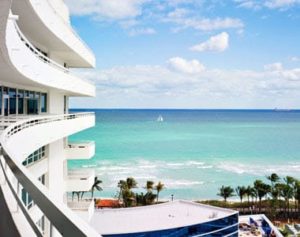 White building near a tropical beach