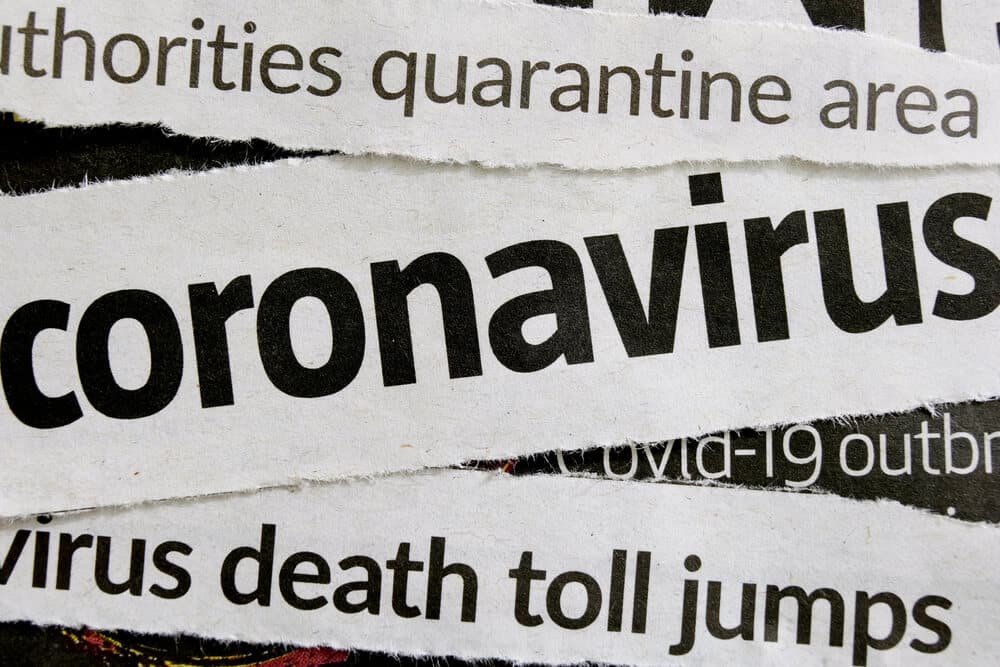 Torn newspaper headlines reading "coronavirus," "authorities quarantine area," and "virus death toll jumps."