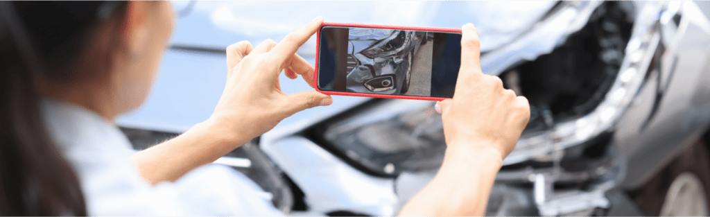 Woman taking photo of accident in Washington DC